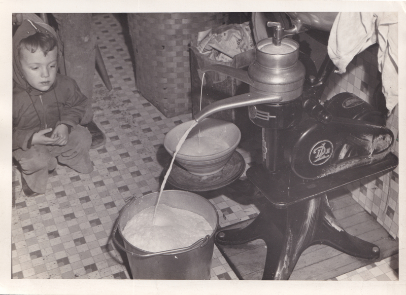 Casler Boy Contemplates Milk Separator c. 1951